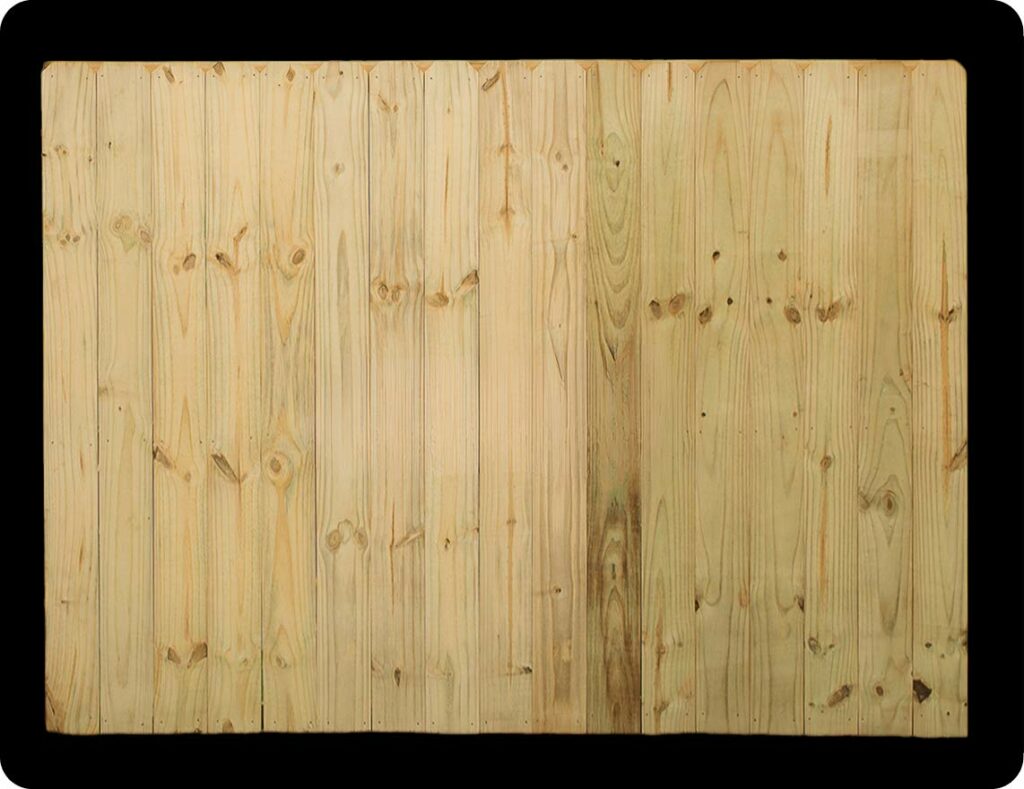 Pressure-treated wood fence panels